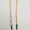 chaine de lunettes acier inoxydable doré grosse maille ronde alternée avec moyenne maille ronde OU grosse maille trombone . Fixation AVBlock ou Classique sur les branches de lunettes