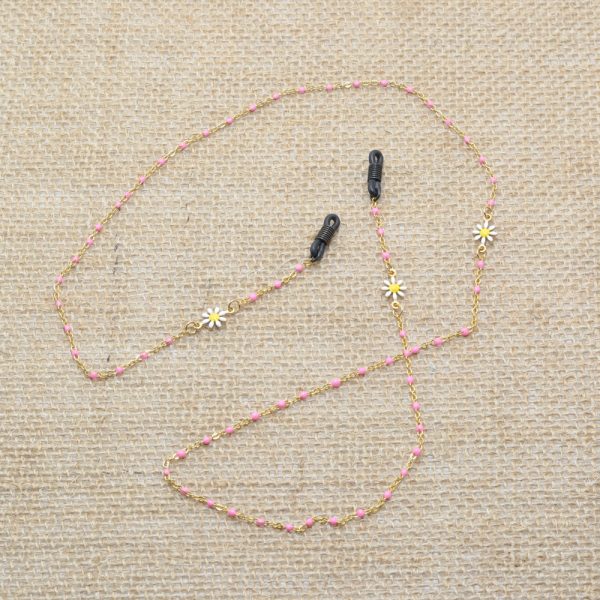 Chaine de lunette acier inoxydable doré motif émail coloris rose pastel motif marguerite. Système de fixation incassable classique