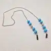 Chaine de lunettes femme maille fine palladium et perles turquoise et métal argenté ajouré, aux couleurs façon Reine des neiges